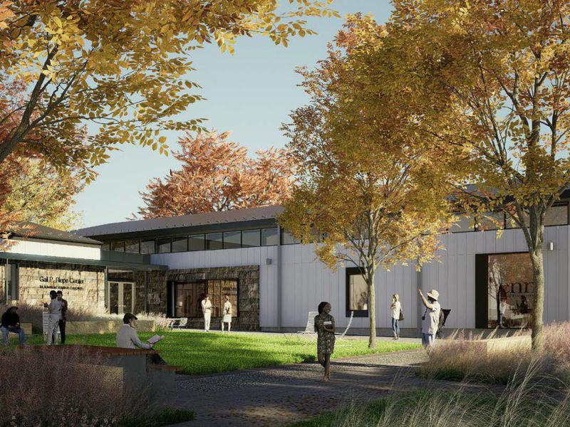 Rendering of modern lab facility surrounded by trees 