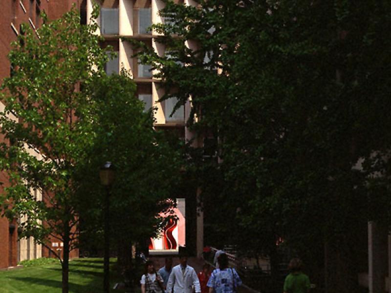 Edward J. Stemmler Hall with people walking out of the building