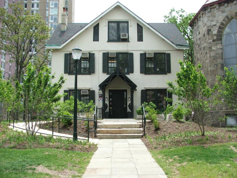 white building with windows and front entrance