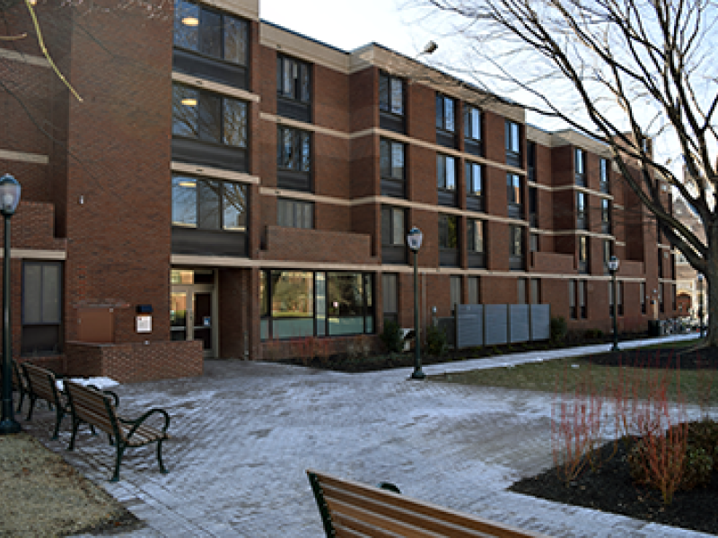 Exterior courtyard and brick facade of Gregory College House 