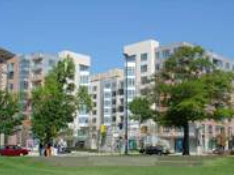 outside of Domus, an eight-story luxury apartment complex