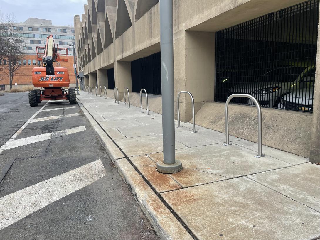 View of bike rack alongside parking garage