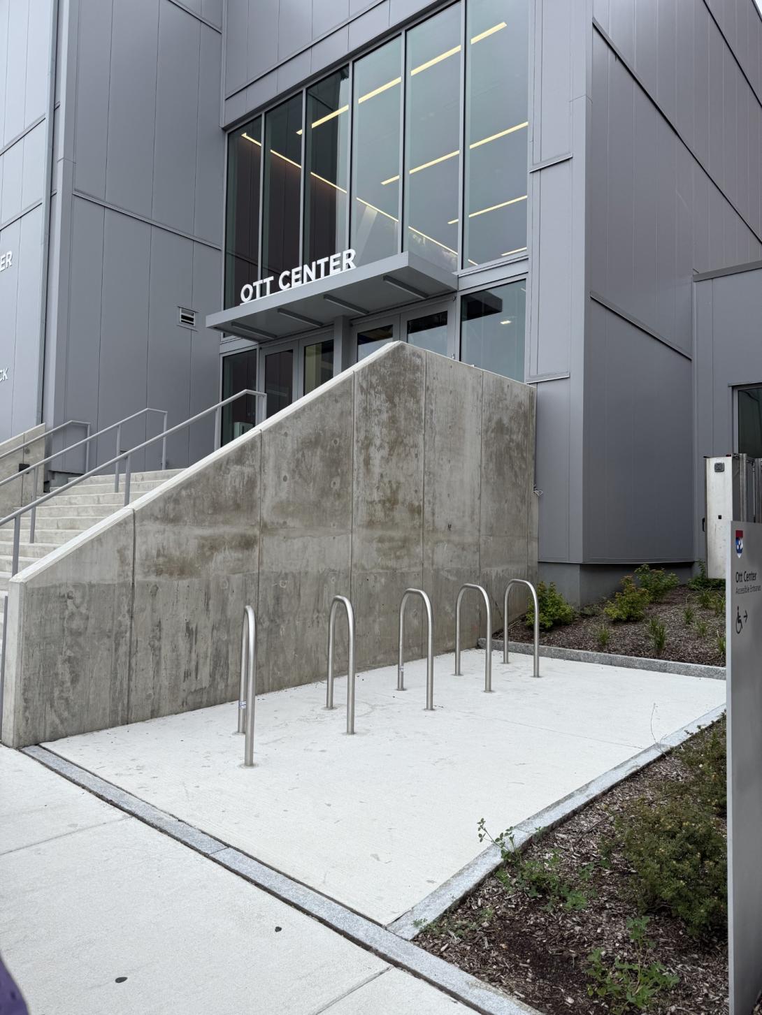 Photo of entrance to Ott center and its bike rack 