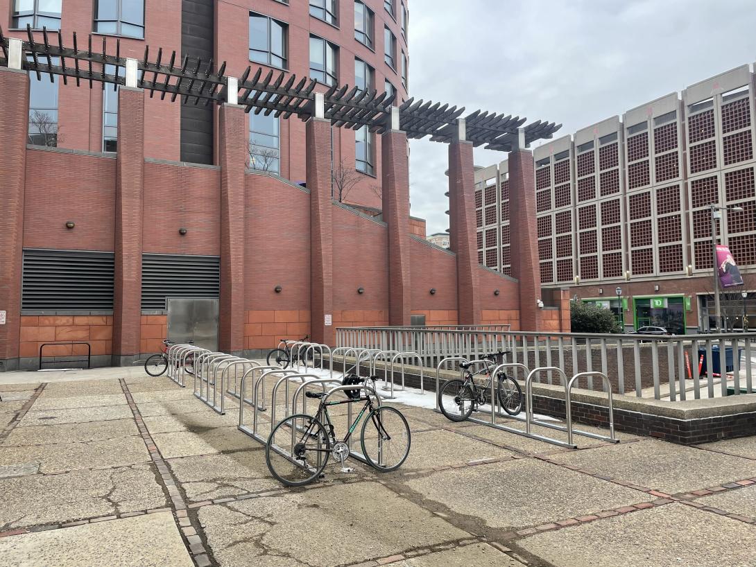 Image of bike corral and parked bikes outside of solomon building