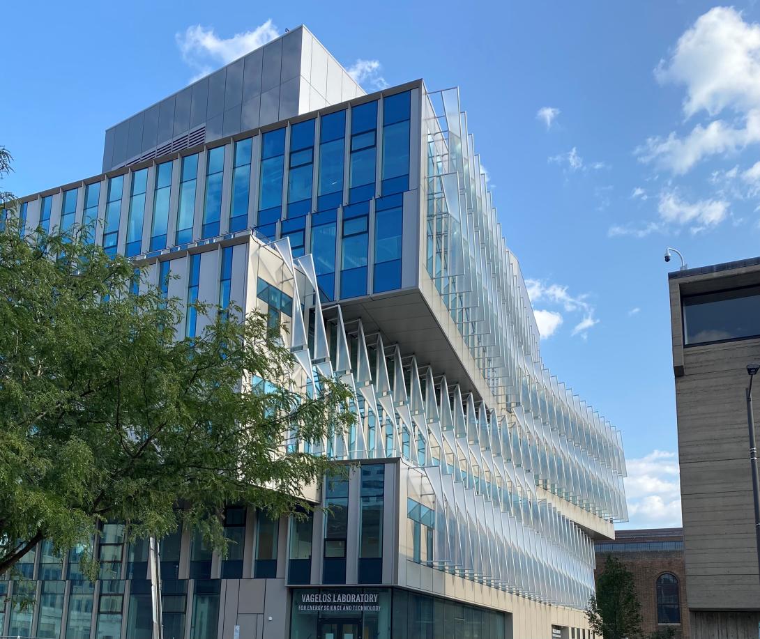 exterior street view of glass windows and unique sunshades at VLEST 