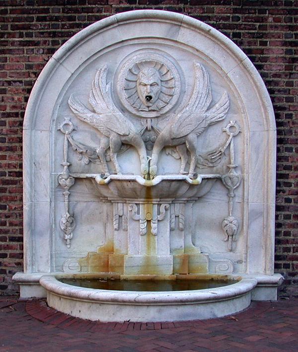 University Museum Fountain in front of a brick wall