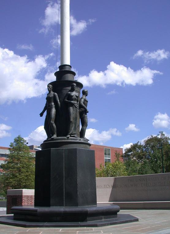 War Memorial Flagpole with figures at the base