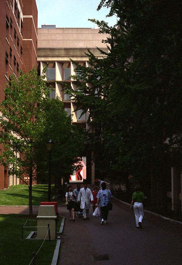 Edward J. Stemmler Hall with people walking out of the building