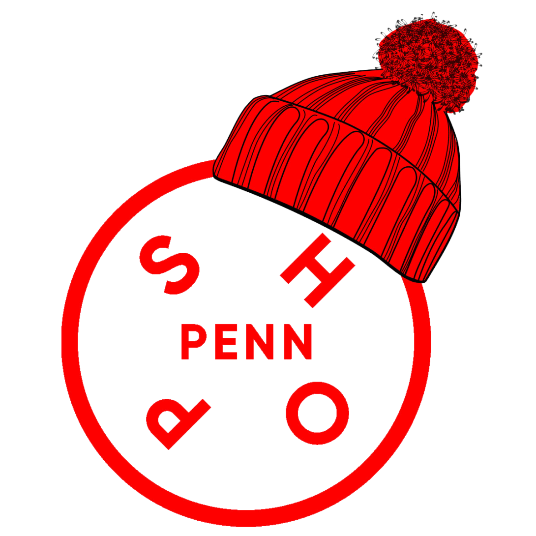 Shop Penn logo wearing a winter hat 