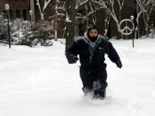Penn student walks in deep snow