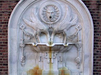 University Museum Fountain in front of a brick wall