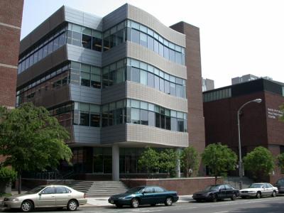 Pottruck Center with cars parked in the front