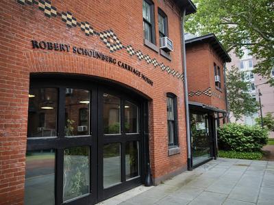 Brick facade of the Robert Schoenberg Carriage House