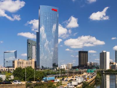 View of FMC tower next to busy highway and river 