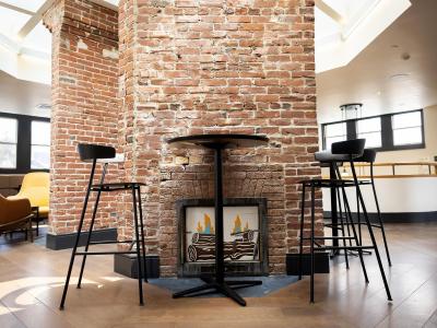 brick fireplaces in the interior of the quad 