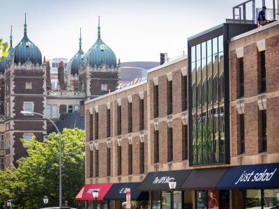 Street view of Stouffer dormitory with retail on bottom level 